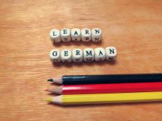 stock-photo-70546255-caption-beads-learn-german-and-colored-pencils